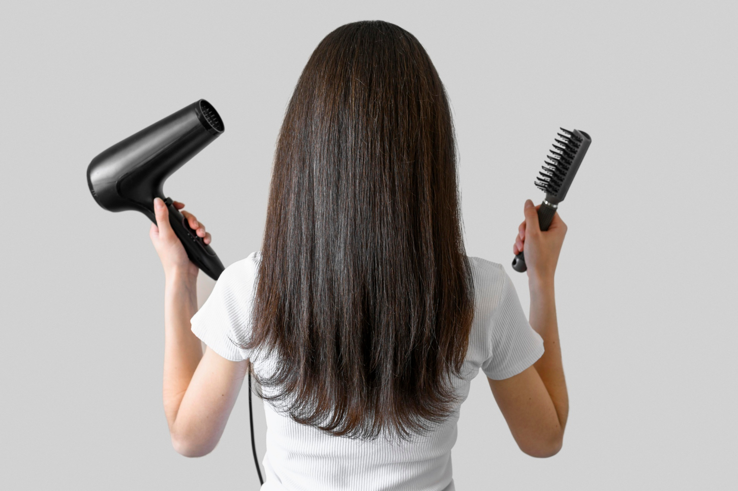 portrait-woman-with-brush-hairdryer