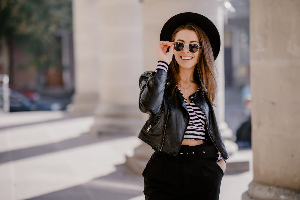 french-pretty-young-brown-haired-girl-leather-jacket-black-hat-city-promenade