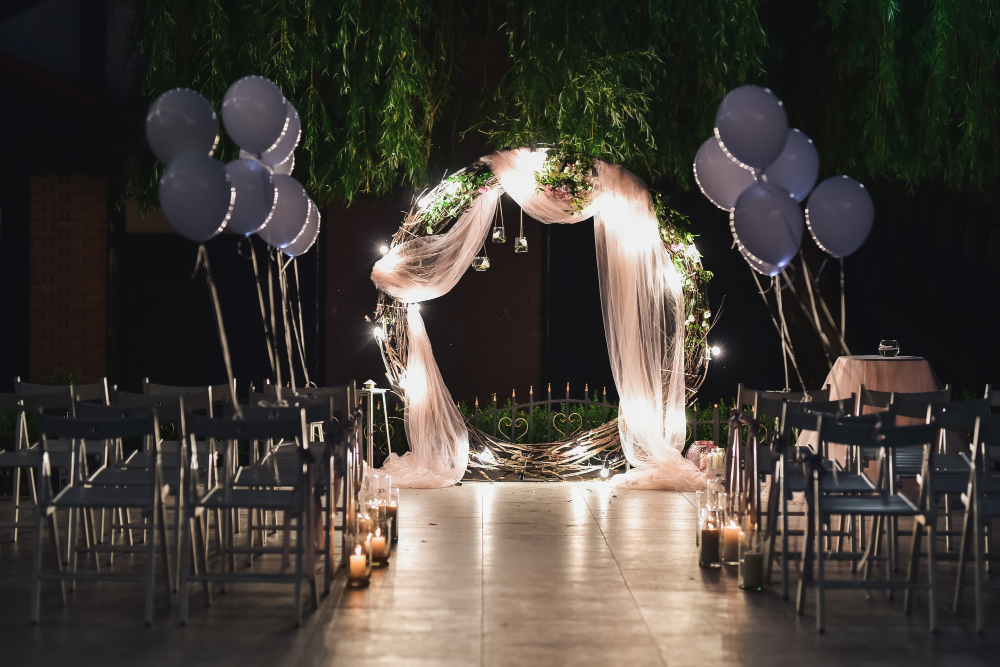 shine-wedding-altar-newlyweds-stands-backyard-decorated-with-balloons
