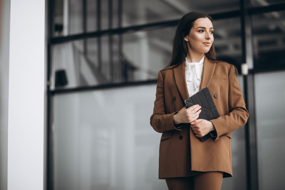 young-business-woman-standing-suit-office