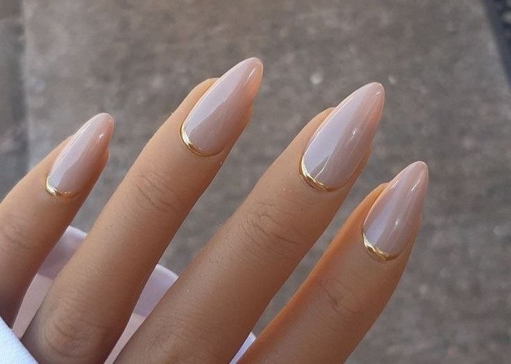 Nails with gold cuticle design
